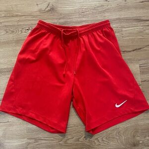 Nike Red Men's Athletic Shorts with White Swoosh Small